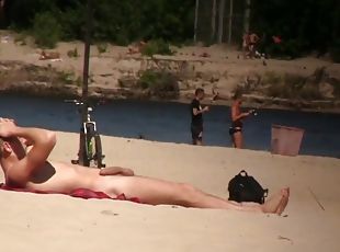 Two hard dicks flaunt on a nudist beach